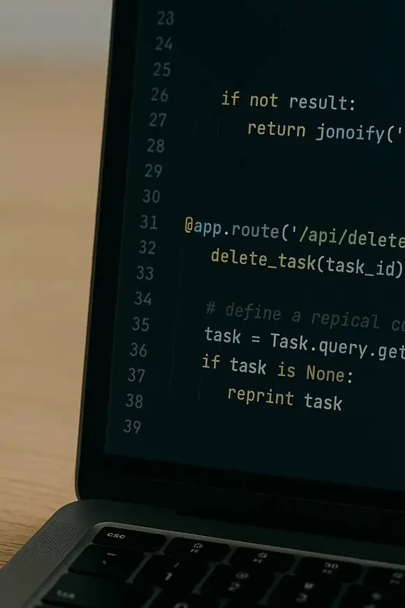 Laptop screen displaying Python code for a backend API endpoint, representing practical execution and technical implementation.